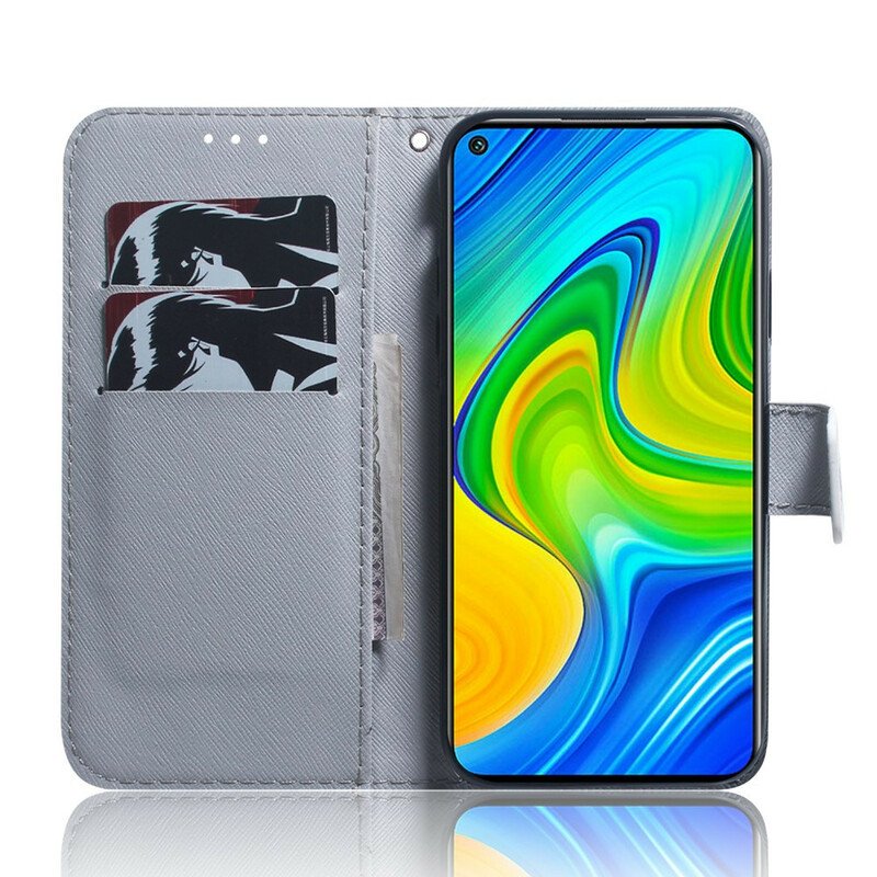 Läderfodral Xiaomi Redmi Note 9 Blommande Träd Blå Bakgrund